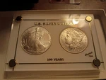 Unc Us Silver Dollars, 1904-O Morgan, 2003 American Eagle.in Holder. Fixed Price $210.00.